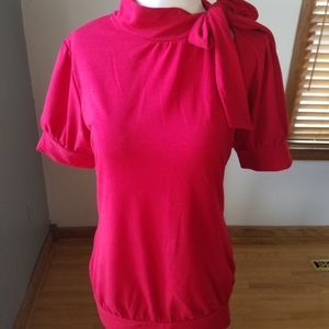 Red tie-neck blouse